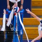 Three volleyball players