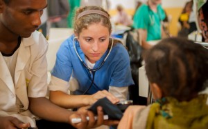UTHSCSA medical student Lauren Scalercio checks the blood pressure of a patient at the government health clinic in Alete Wondo.