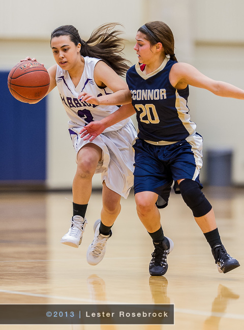 Kasey Saldana of O'Connor Panthers and Lexy Salas of Warren Warriors during a game at Paul Taylor Field house in San Antonio