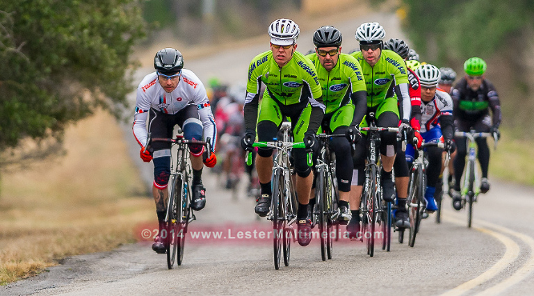 Racers ride up Hueco Springs Rd. during the Tour of New Braunfels bike race.  Click here to order images.