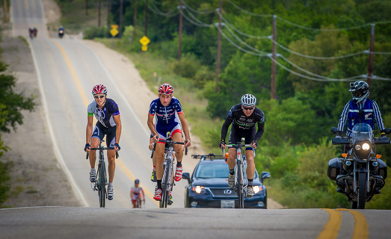 Racers climb a grueling hill during the Texas State Road Championships held at Ft. Hood.  The race was won by Ryan Wohlrabe of Bicycle Heaven (right).